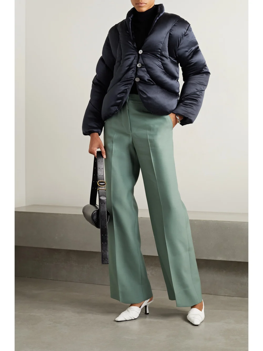 Interior The Mira Quilted Silk-satin Down Jacket, worn by a model