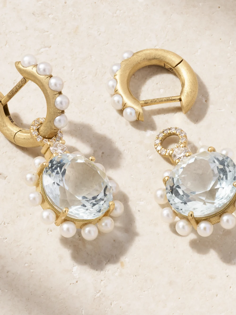 Close-up detail of the Irene Neuwirth Classic Huggies 18-karat Gold Multi-stone Earrings