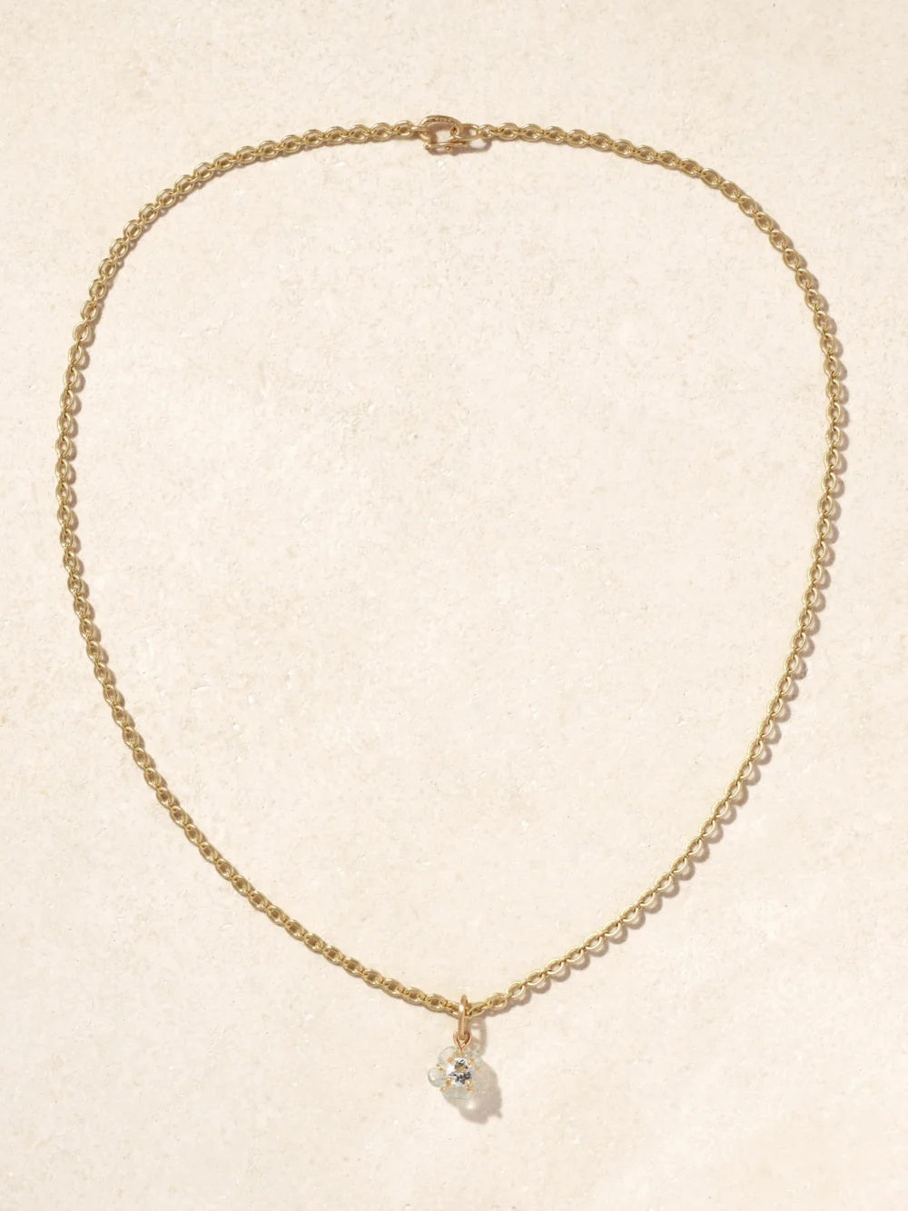 Close-up detail of the Irene Neuwirth Tropical Flower 18-karat Gold Aquamarine Necklace