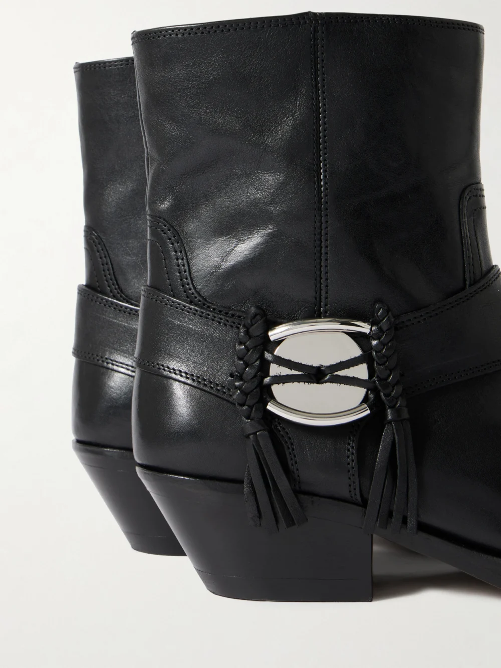 Close-up detail of the Isabel Marant Akson Embellished Tasseled Leather Ankle Boots