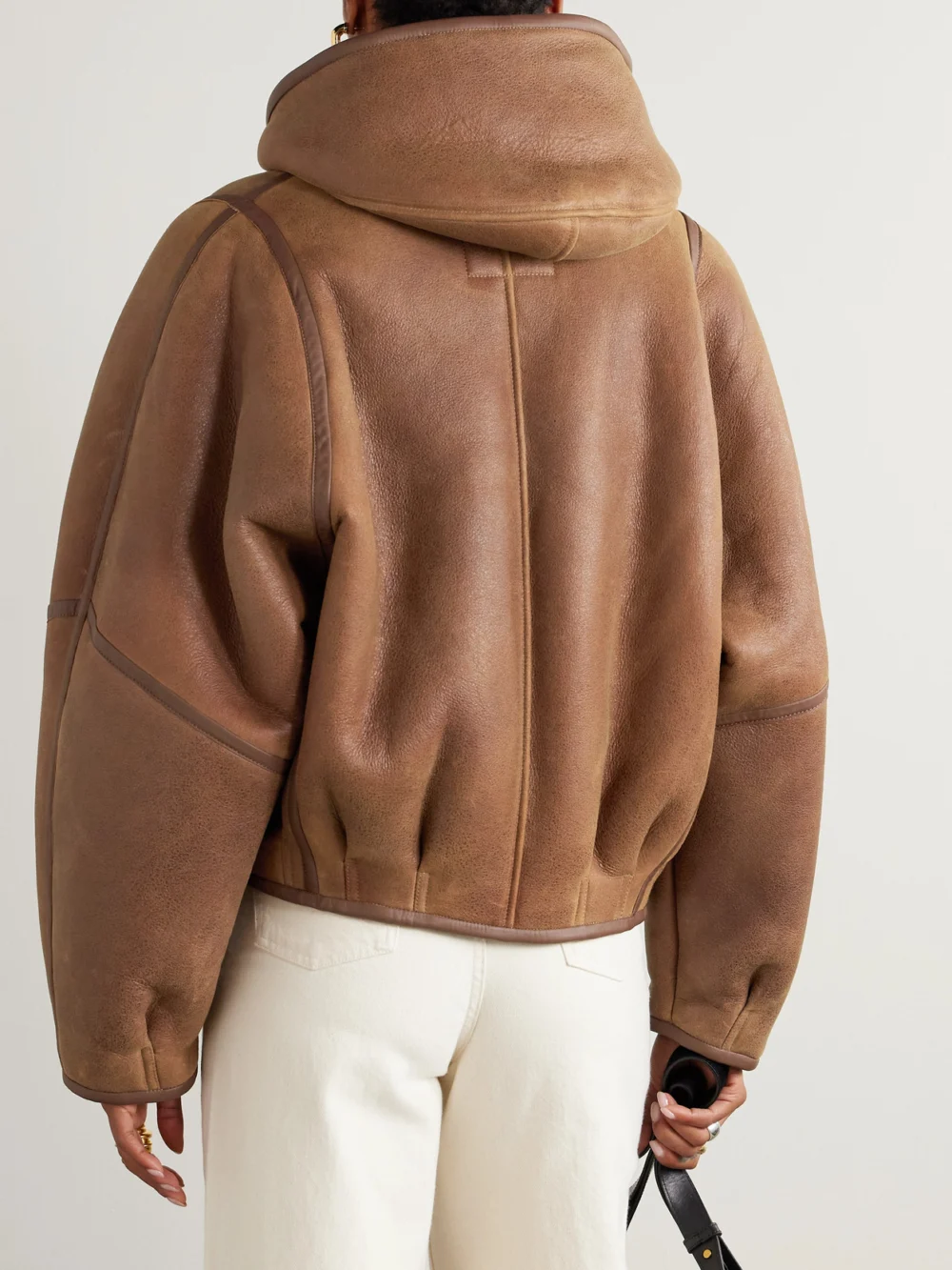 Back view of the Isabel Marant Amiel Leather-trimmed Shearling Hooded Jacket