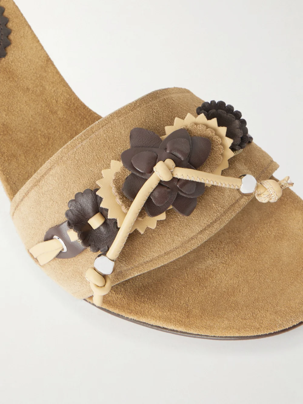 Close-up detail of the Isabel Marant Anee Flower-embellished Suede Wedge Sandals