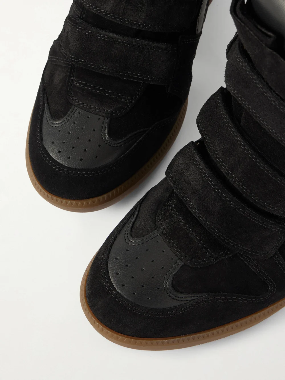 Close-up detail of the Isabel Marant Bekett Leather-trimmed Suede High-top Wedge Sneakers