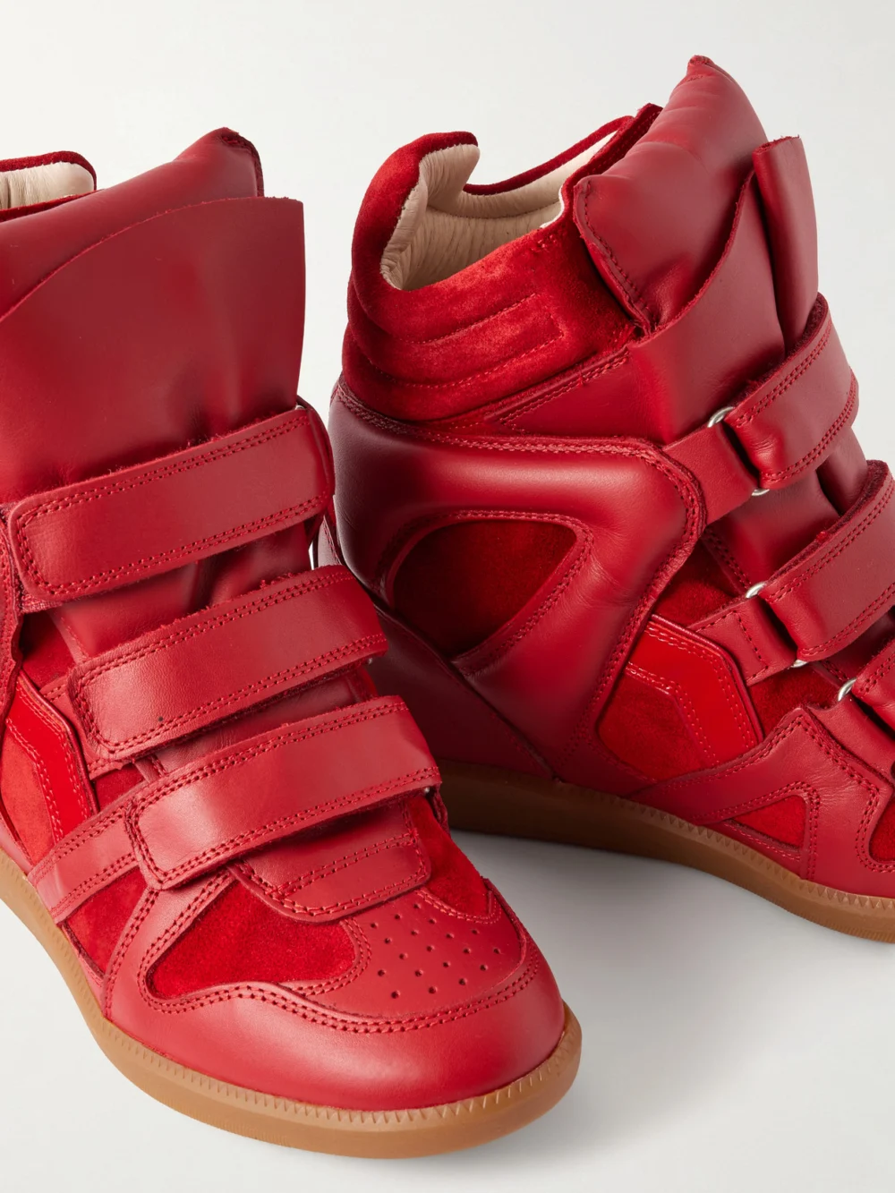 Close-up detail of the Isabel Marant Bekett Leather-trimmed Suede Wedge Sneakers