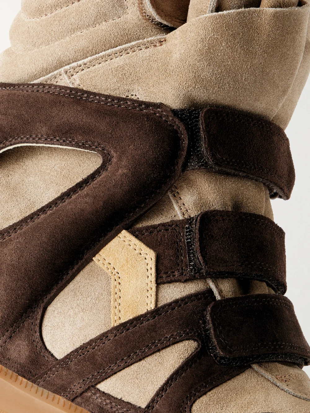 Close-up detail of the Isabel Marant Bekett Two-tone Suede Wedge Sneakers