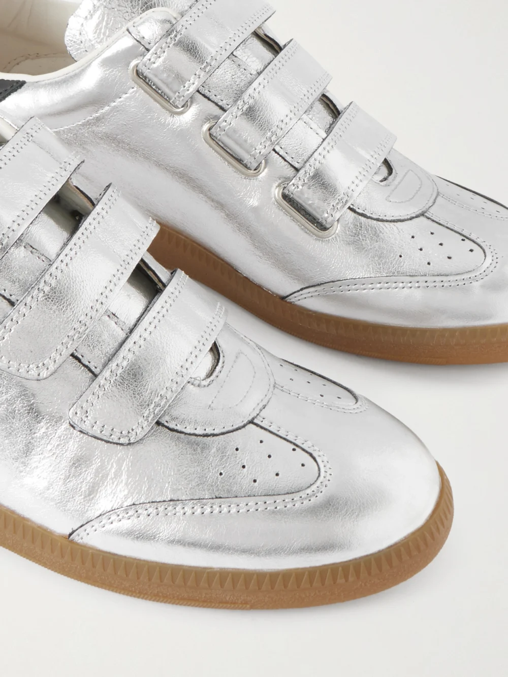 Close-up detail of the Isabel Marant Beth Metallic Leather Sneakers