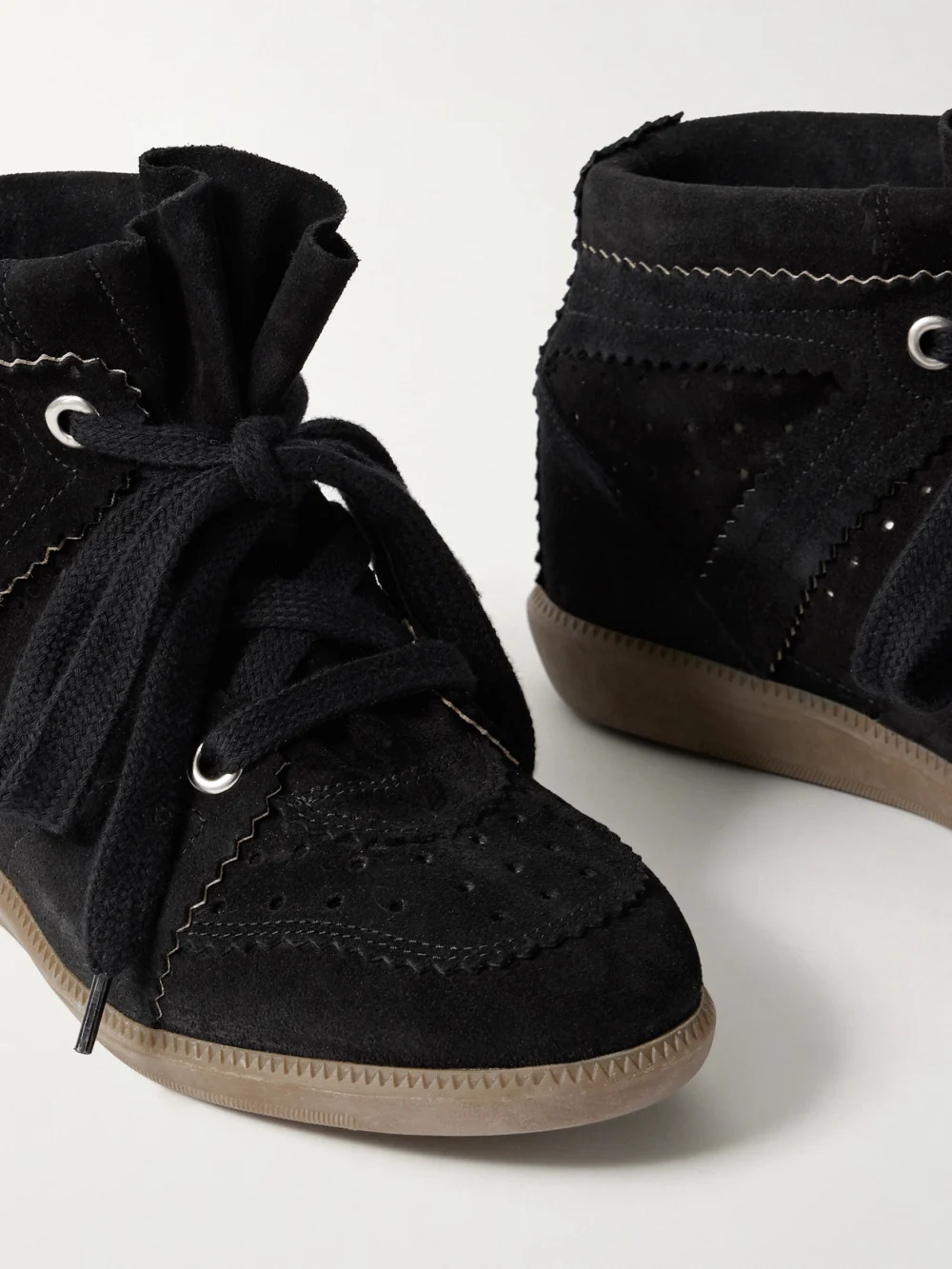 Close-up detail of the Isabel Marant Bobby Suede Wedge Sneakers