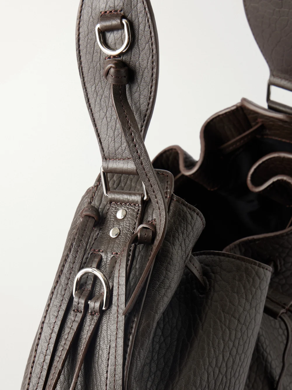 Close-up detail of the Isabel Marant Bolton Tasseled Textured-leather Shoulder Bag