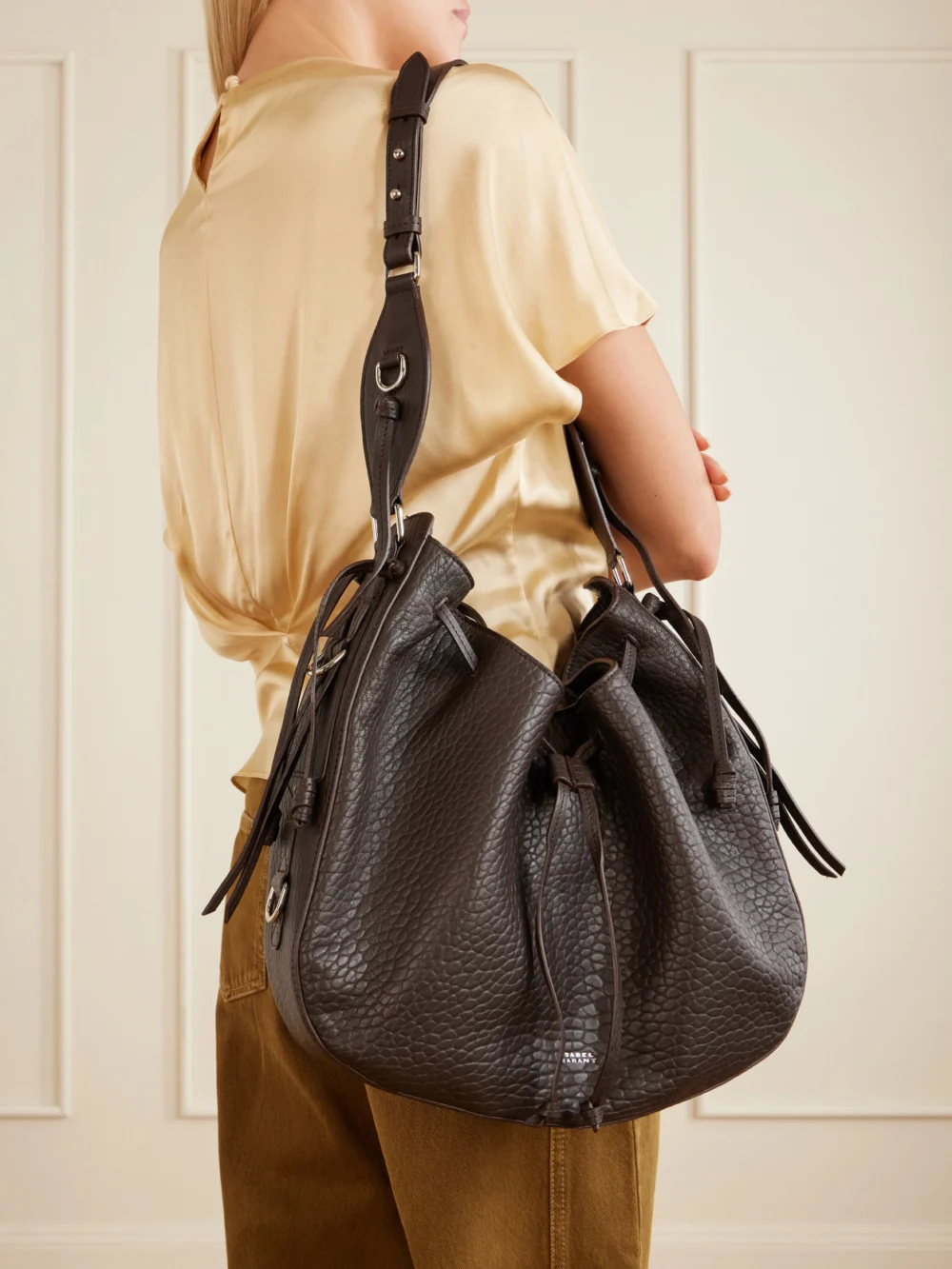 Isabel Marant Bolton Tasseled Textured-leather Shoulder Bag, styled view