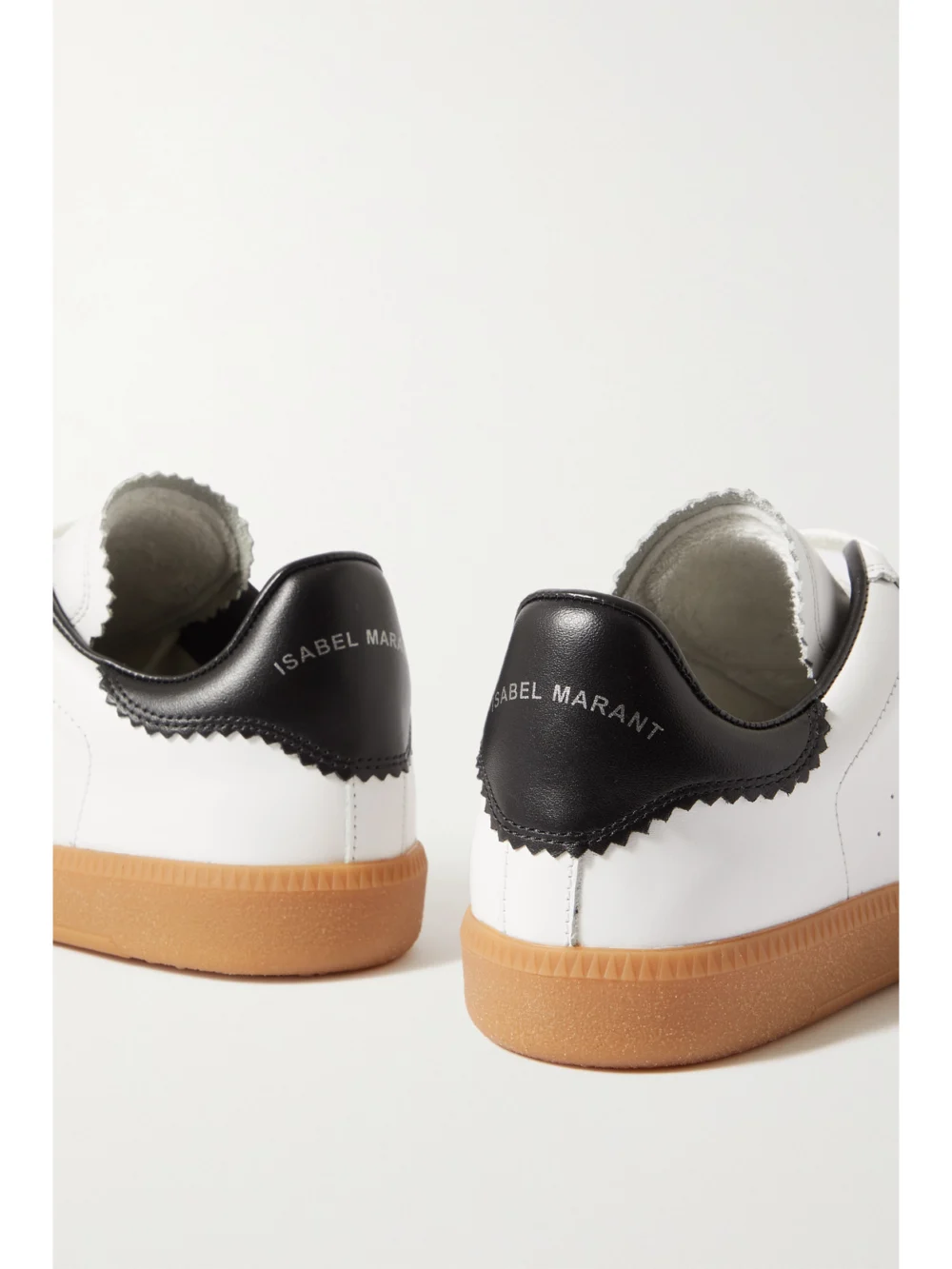 Close-up detail of the Isabel Marant Bryce Suede-trimmed Perforated Leather Sneakers