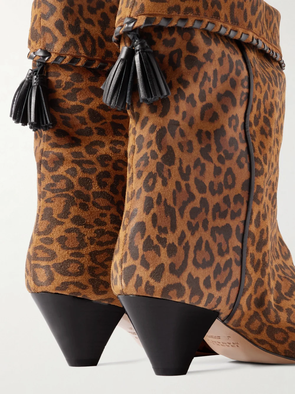 Close-up detail of the Isabel Marant Dalby Tasseled Leather-trimmed Leopard-print Suede Ankle Boots