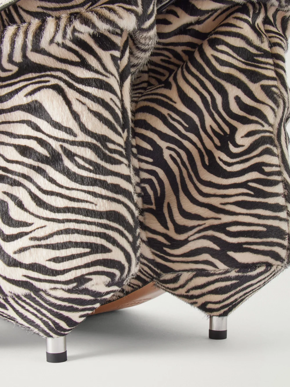 Close-up detail of the Isabel Marant Edrik 40 Zebra-print Calf-hair Ankle Boots