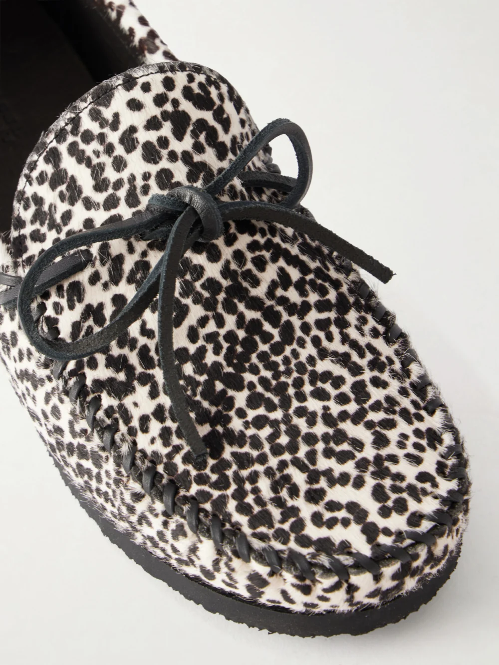 Close-up detail of the Isabel Marant Fitza Animal-print Calf Hair Loafers