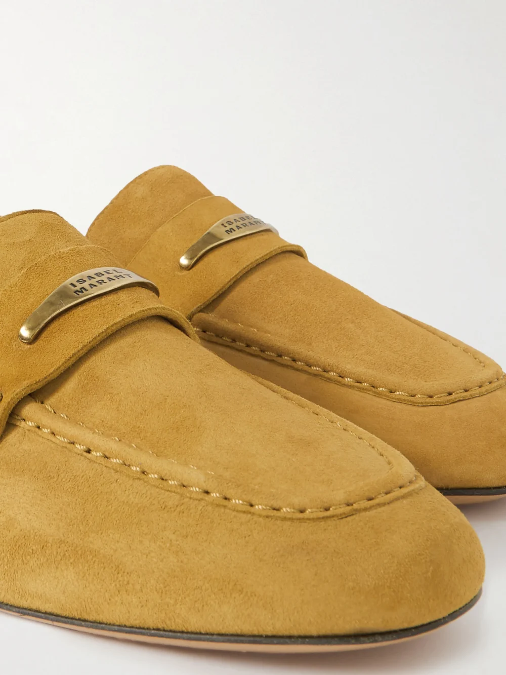 Close-up detail of the Isabel Marant Iseri Embellished Suede Loafers