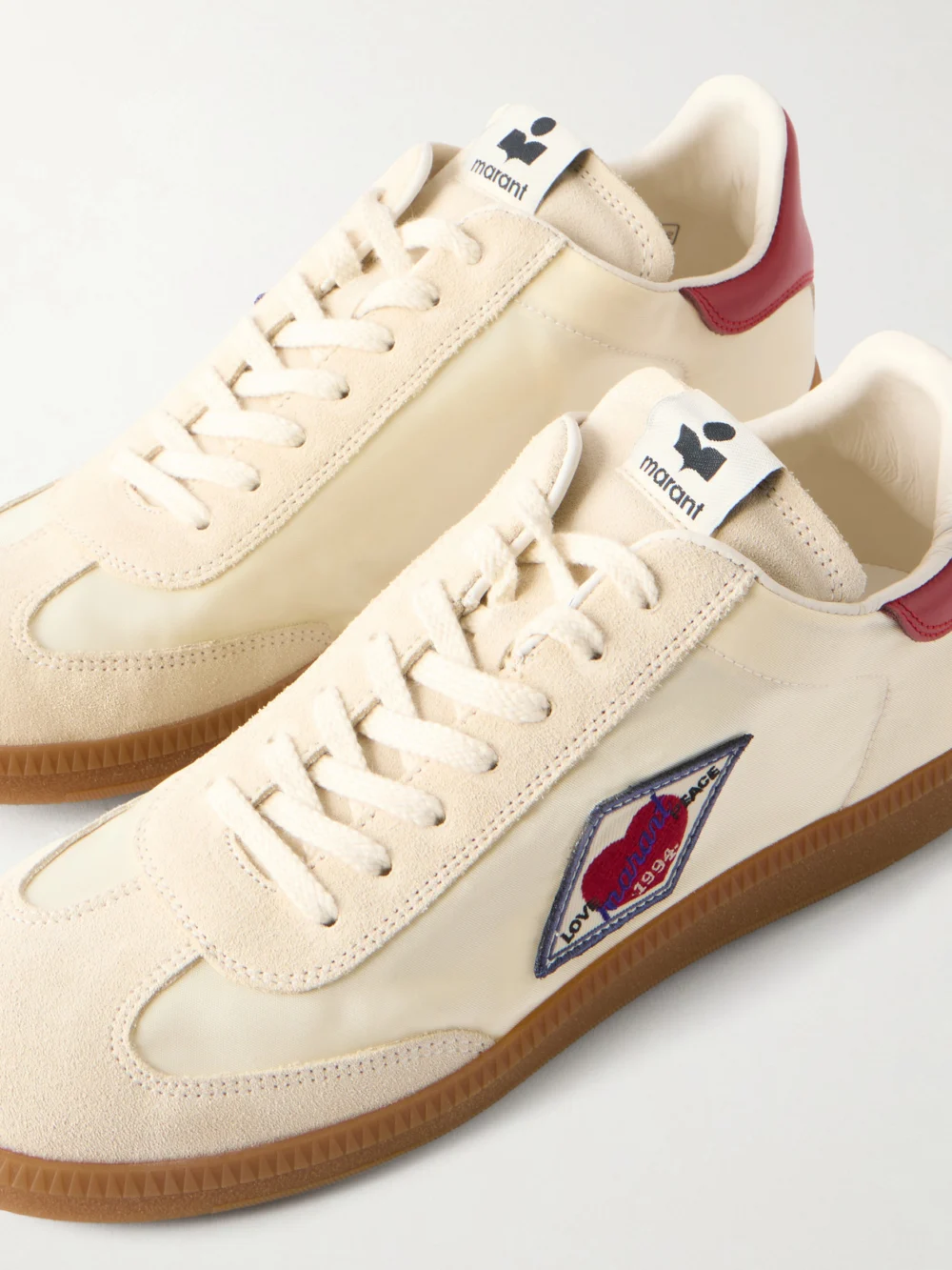 Close-up detail of the Isabel Marant Kaycee Appliquéd Leather Sneakers