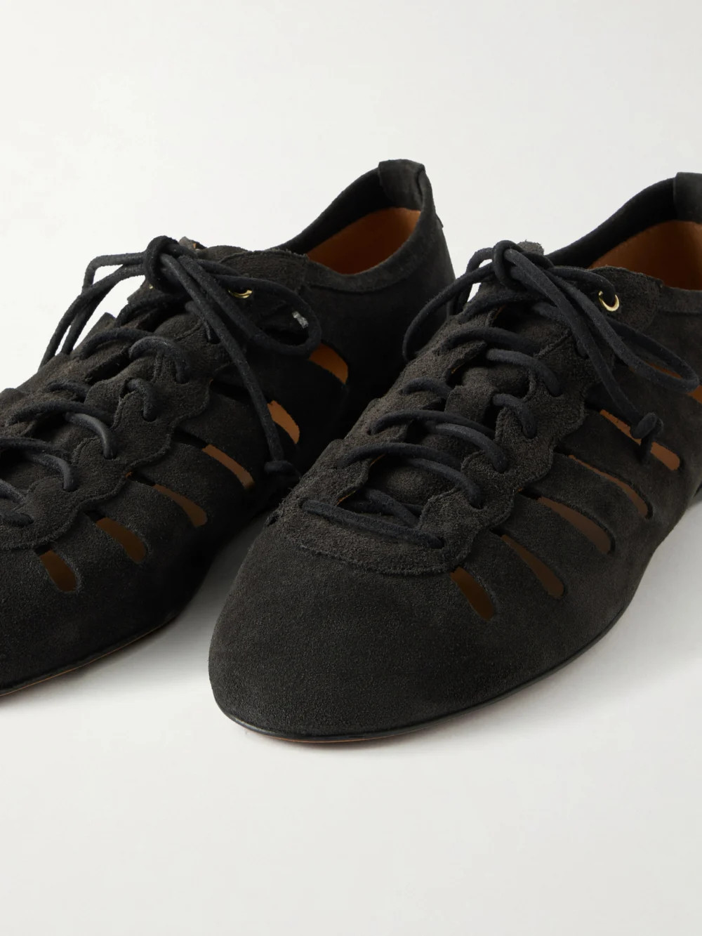 Close-up detail of the Isabel Marant Leyza Cutout Suede Sneakers