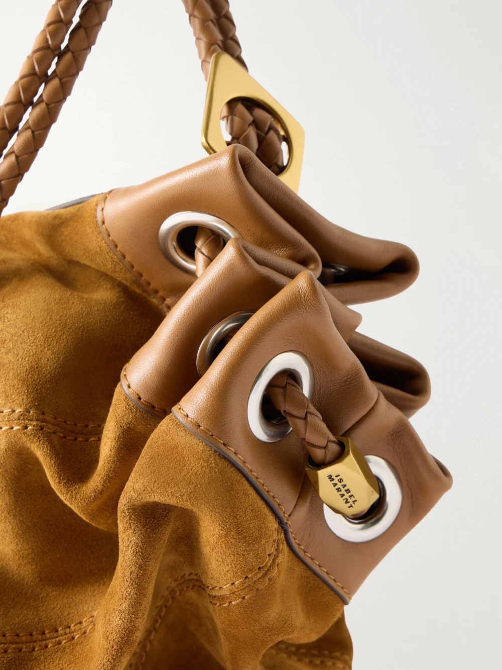 Close-up detail of the Isabel Marant Maia Leather-trimmed Suede Shoulder Bag