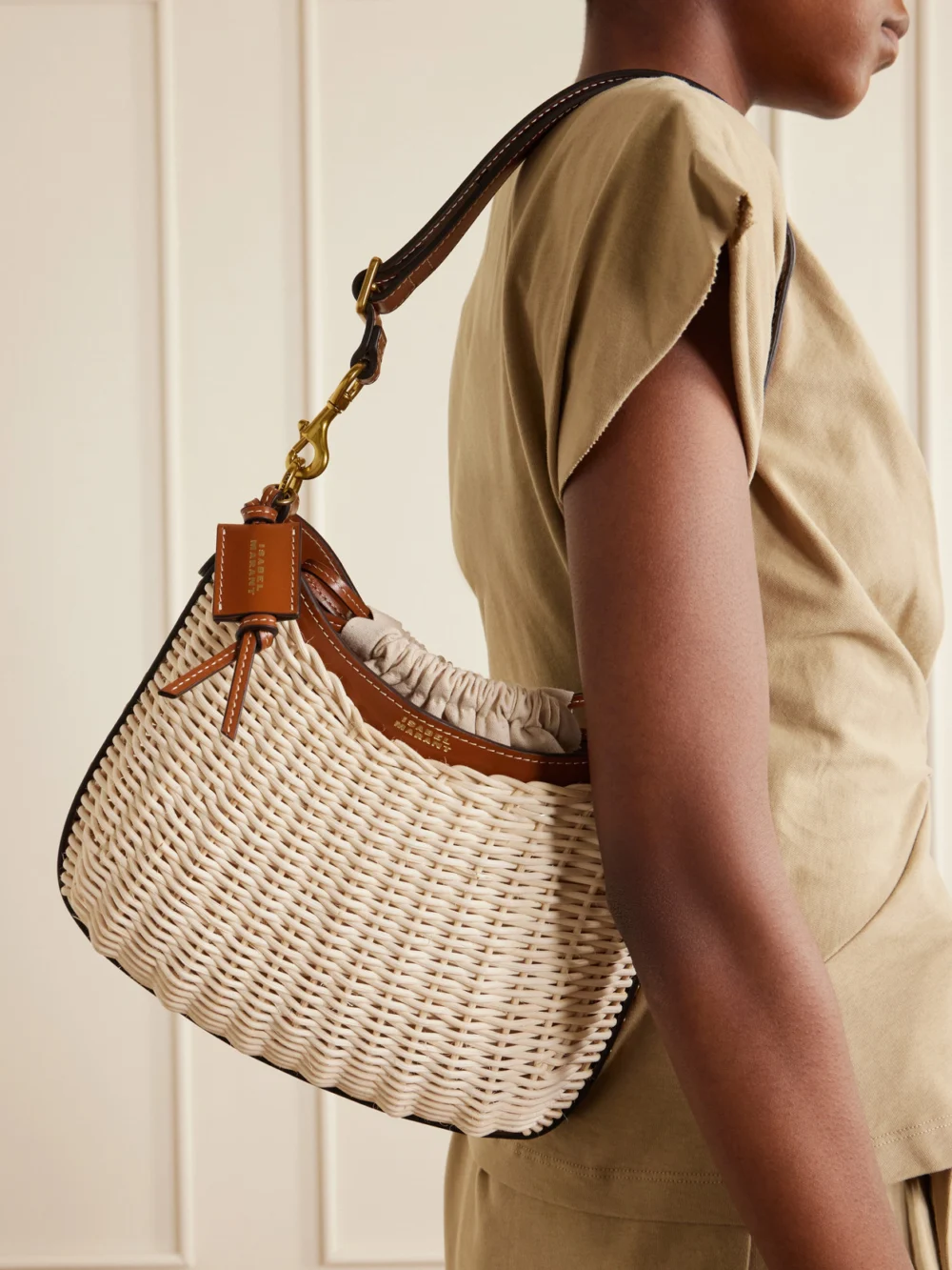 Isabel Marant Oskan Wicker Leather-trimmed Wicker Shoulder Bag, styled view