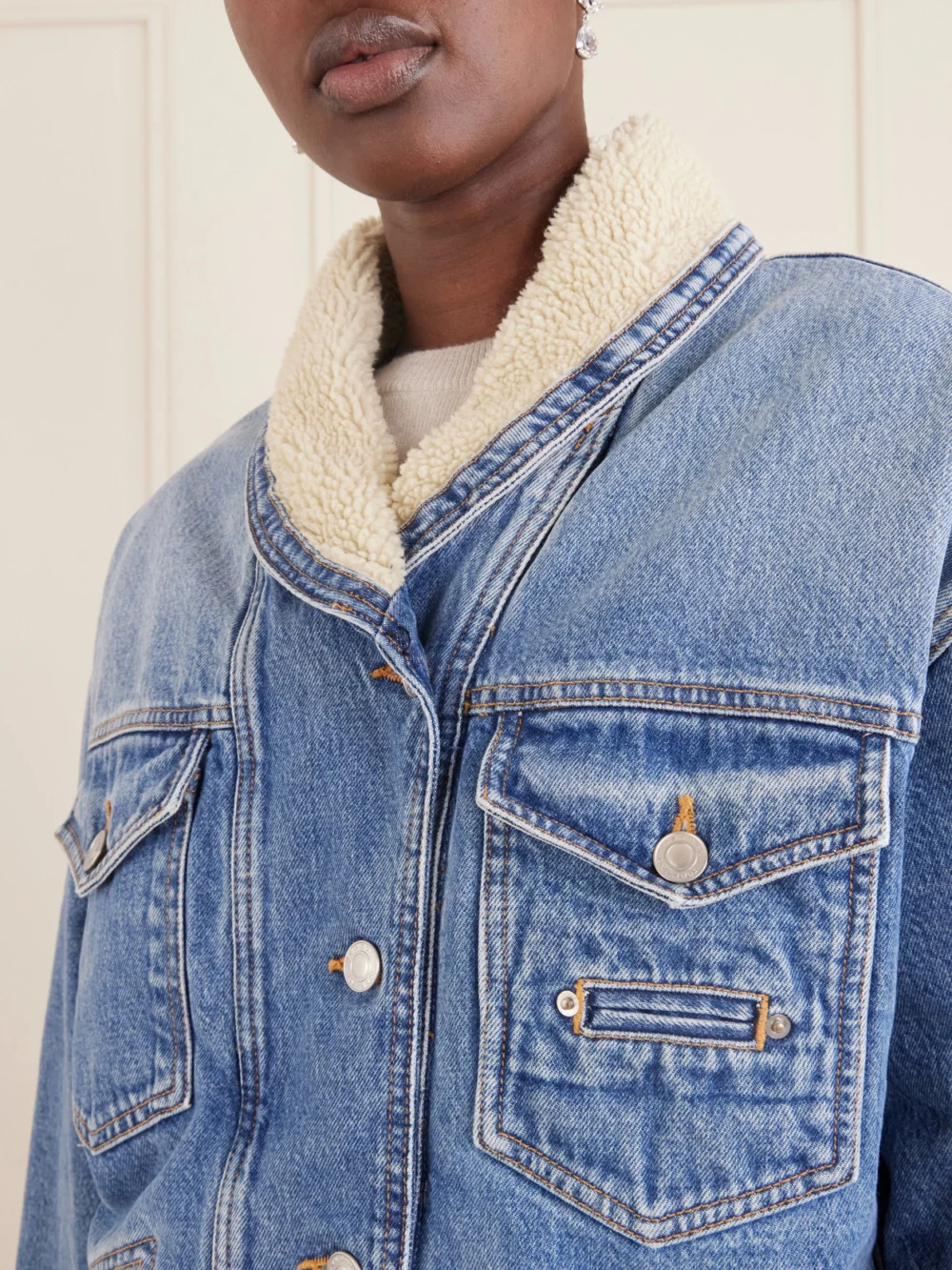 Close-up detail of the Isabel Marant Pimia Plush-trimmed Denim Jacket