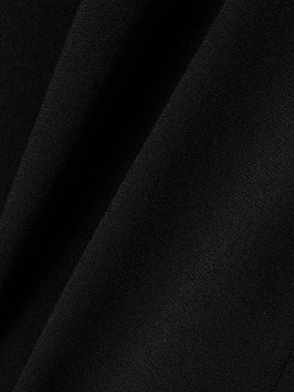 Close-up detail of the Isabel Marant Pleated Crepe Jumpsuit