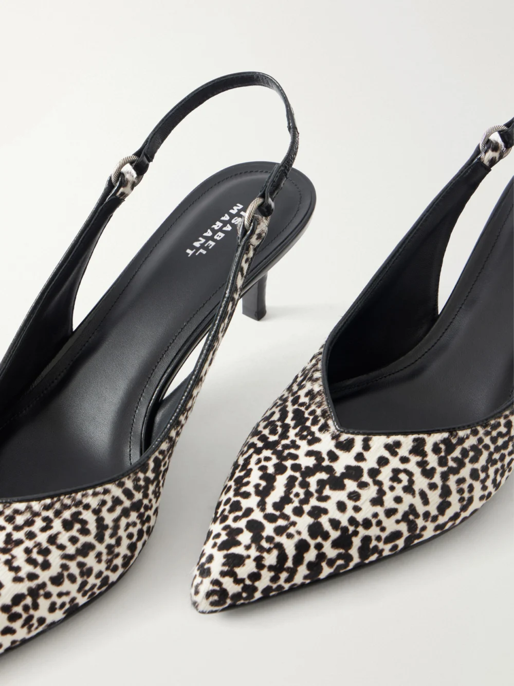 Close-up detail of the Isabel Marant Polyn Animal-print Calf Hair Slingback Pumps