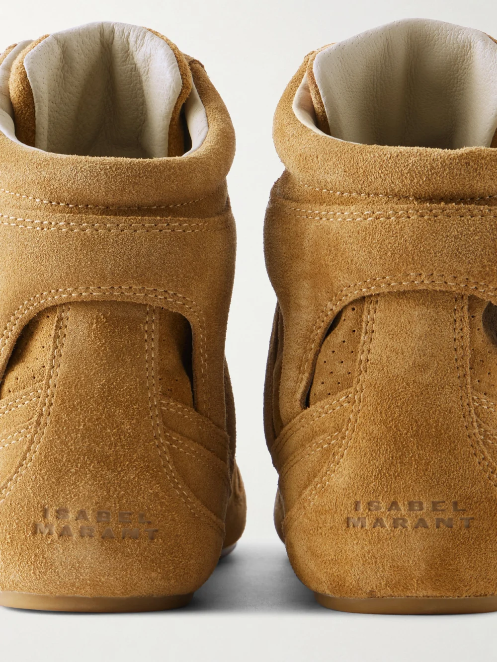 Close-up detail of the Isabel Marant Senny Perforated Suede High-top Sneakers