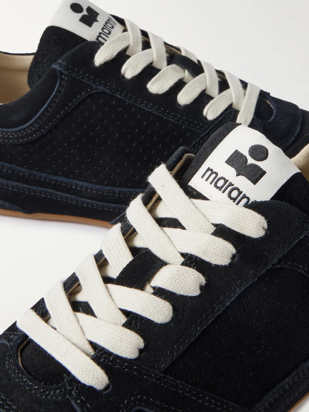 Close-up detail of the Isabel Marant Senny Perforated Suede Sneakers
