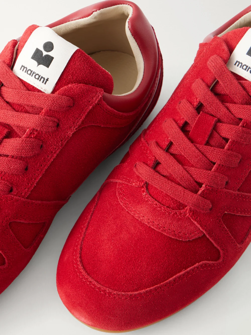 Close-up detail of the Isabel Marant Senny Perforated Suede Sneakers