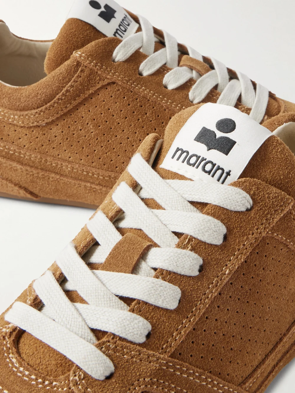Close-up detail of the Isabel Marant Senny Perforated Suede Sneakers