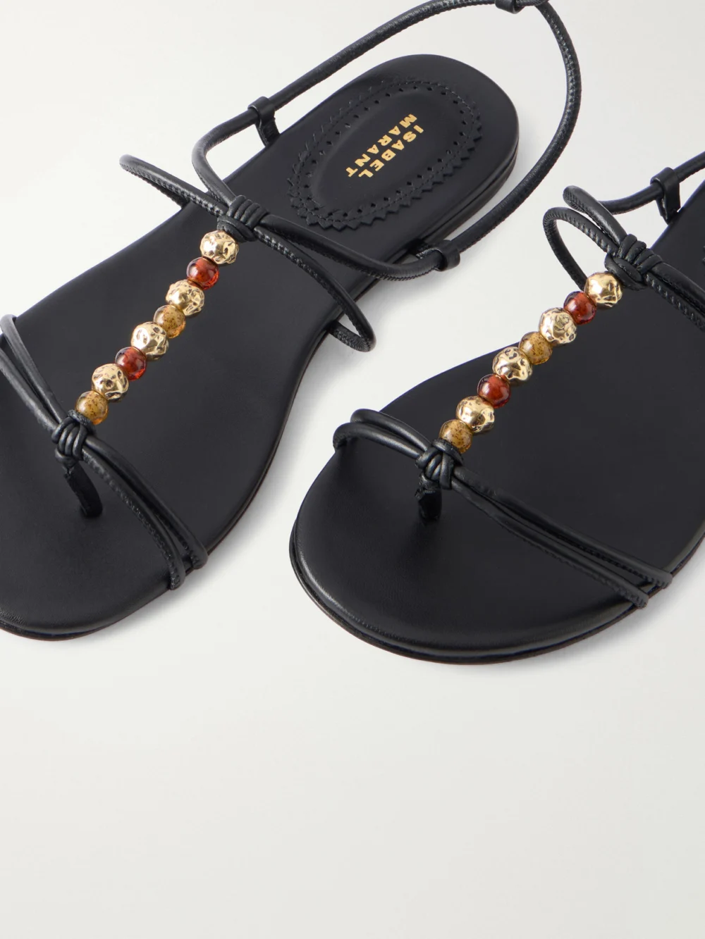 Close-up detail of the Isabel Marant Yctoria Beaded Leather Sandals