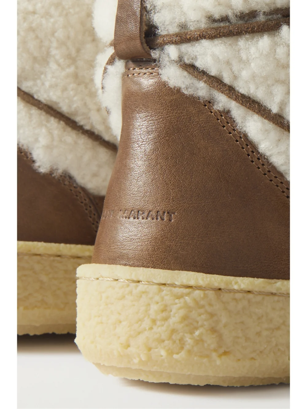Close-up detail of the Isabel Marant Zimlee Shearling and Leather Ankle Boots