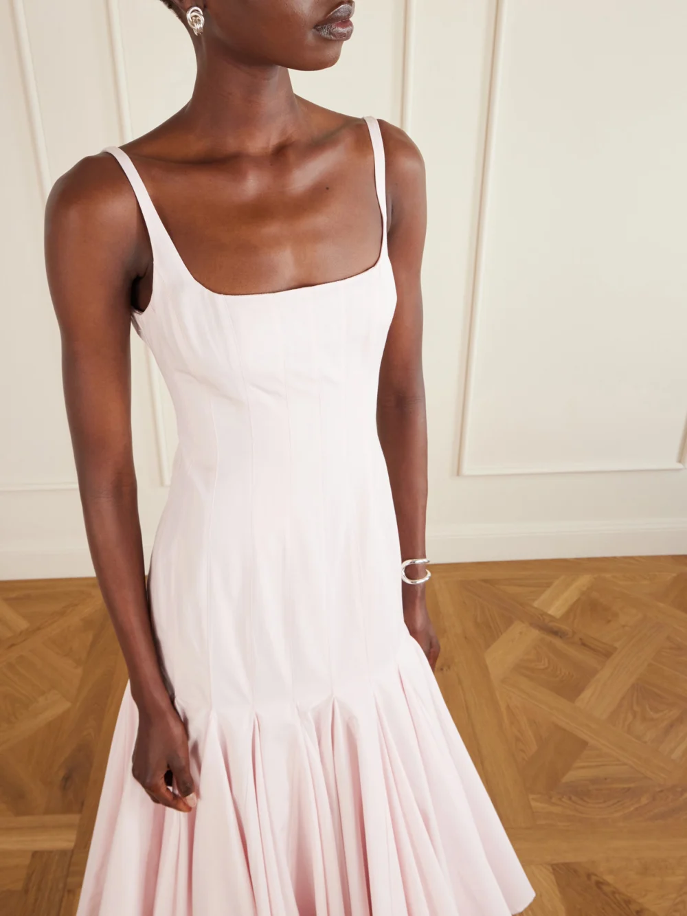 Close-up detail of the Jacquemus Agave Paneled Pleated Cotton-poplin Midi Dress