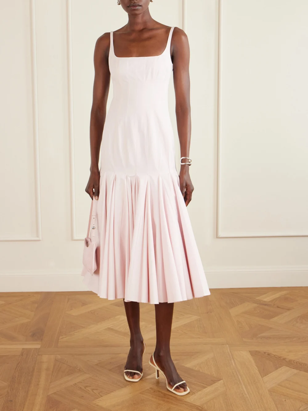 Jacquemus Agave Paneled Pleated Cotton-poplin Midi Dress, worn by a model