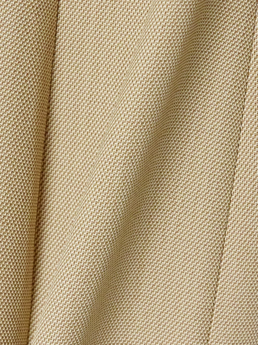 Close-up detail of the Jacquemus Casaco Belted Open-back Twill Mini Dress