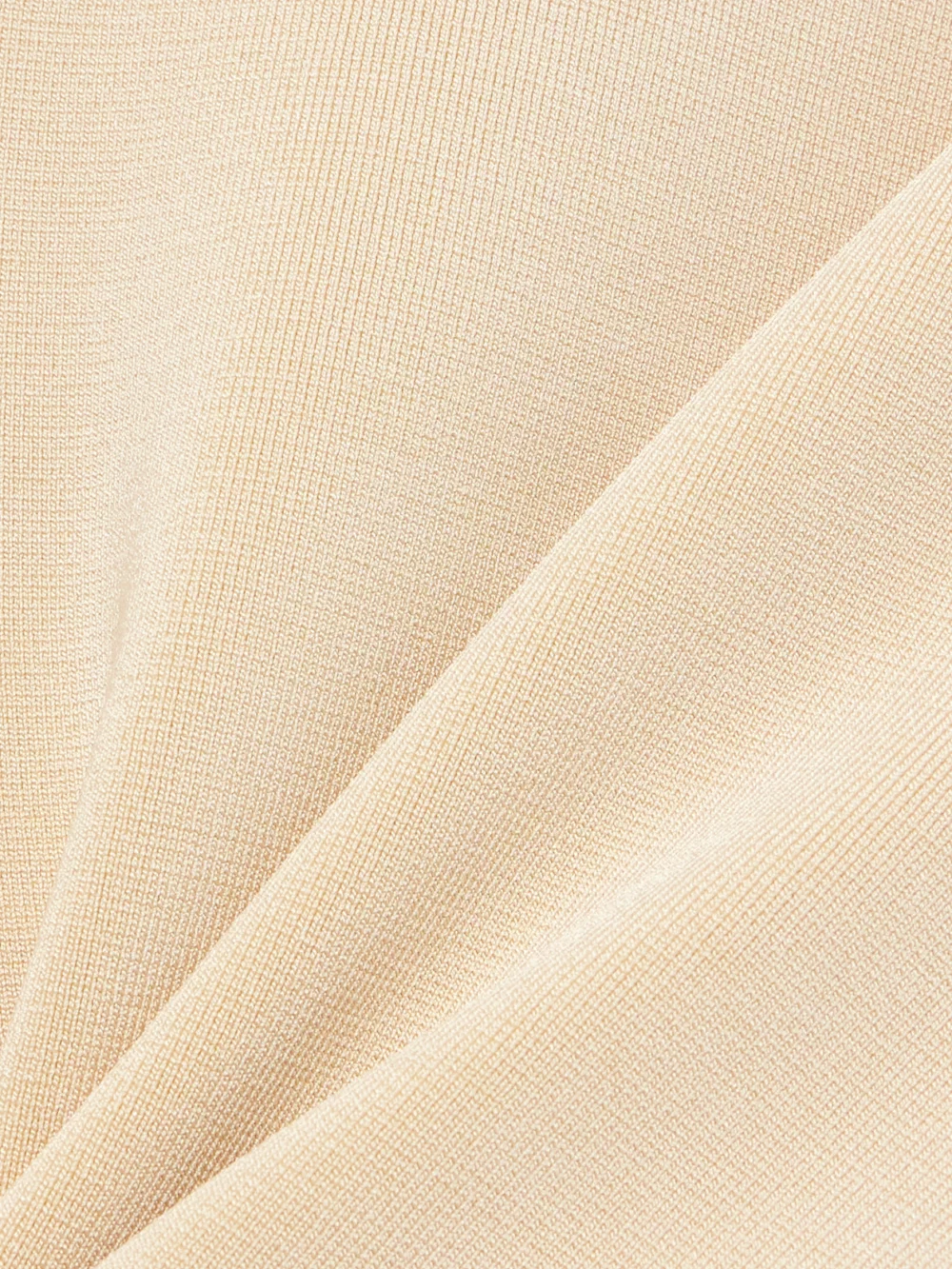 Close-up detail of the Jacquemus Cubista Off-the-shoulder Open-back Stretch-knit Mini Dress