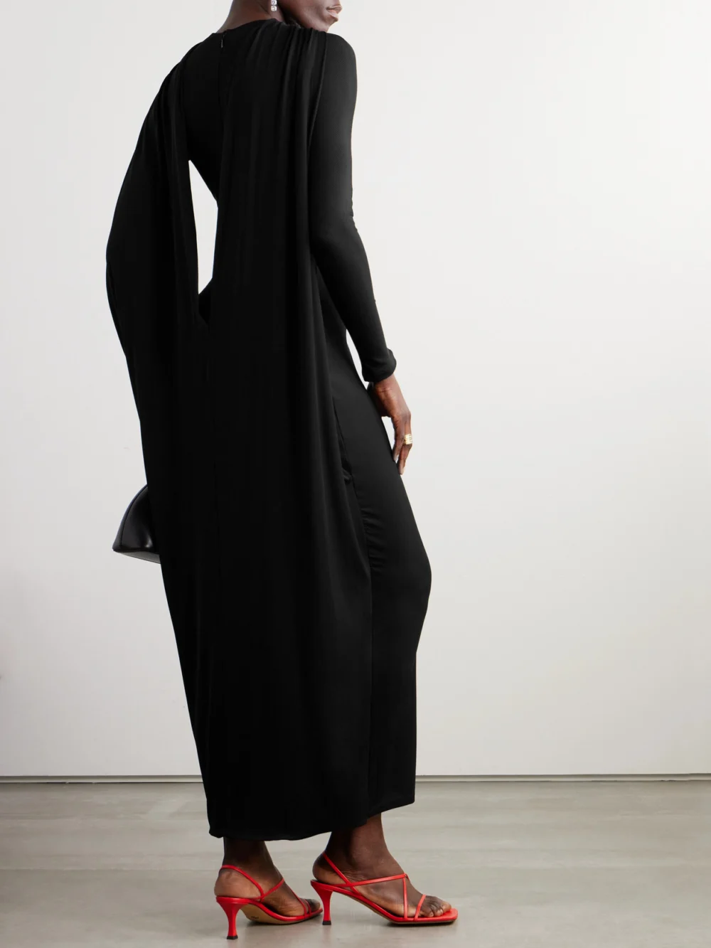 Back view of the Jacquemus Joya Cape-effect Ribbed Jersey Maxi Dress