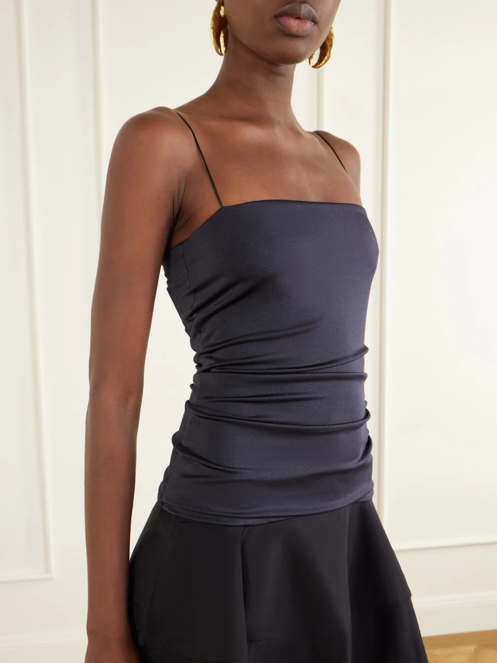 Close-up detail of the Jacquemus La Robe Paradiso Satin Midi Dress