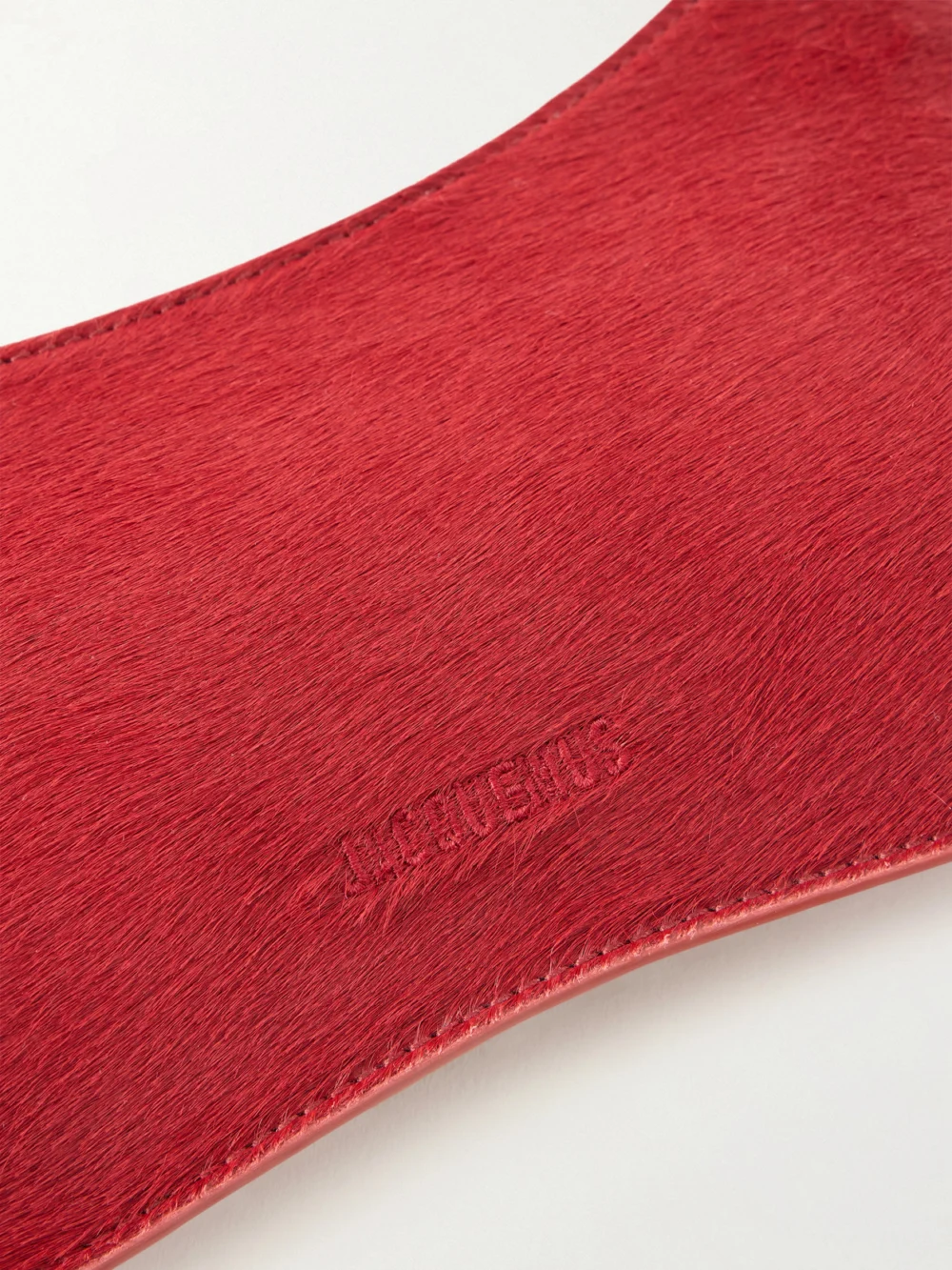 Close-up detail of the Jacquemus Le Bisou Embellished Leather-trimmed Calf Hair Shoulder Bag