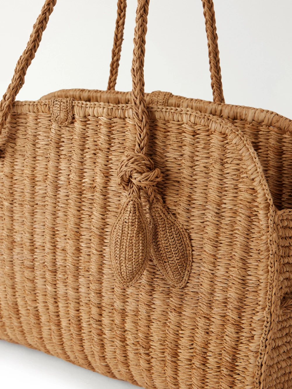 Close-up detail of the Jacquemus Le Turismo Leather-trimmed Raffia Shoulder Bag
