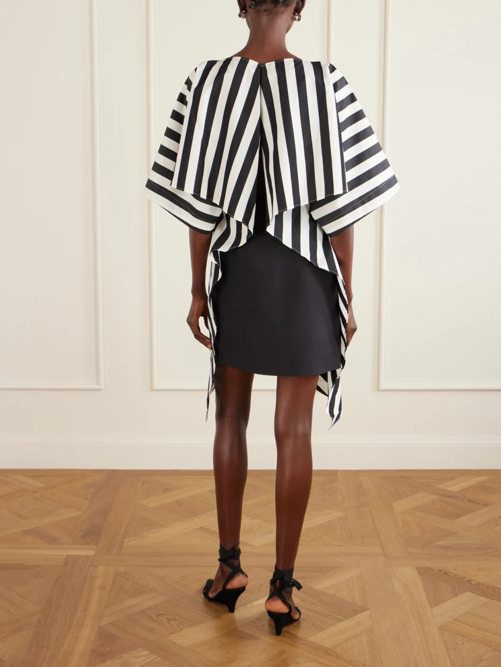 Back view of the Jacquemus Moisson Oversized Striped Cotton and Silk-blend Midi Dress