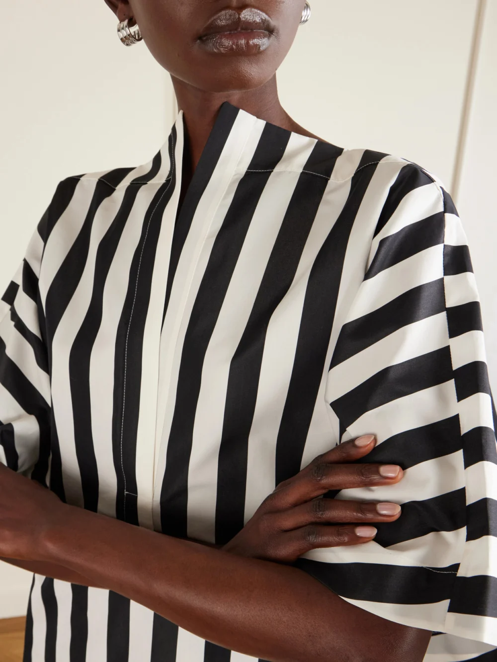 Close-up detail of the Jacquemus Moisson Oversized Striped Cotton and Silk-blend Midi Dress