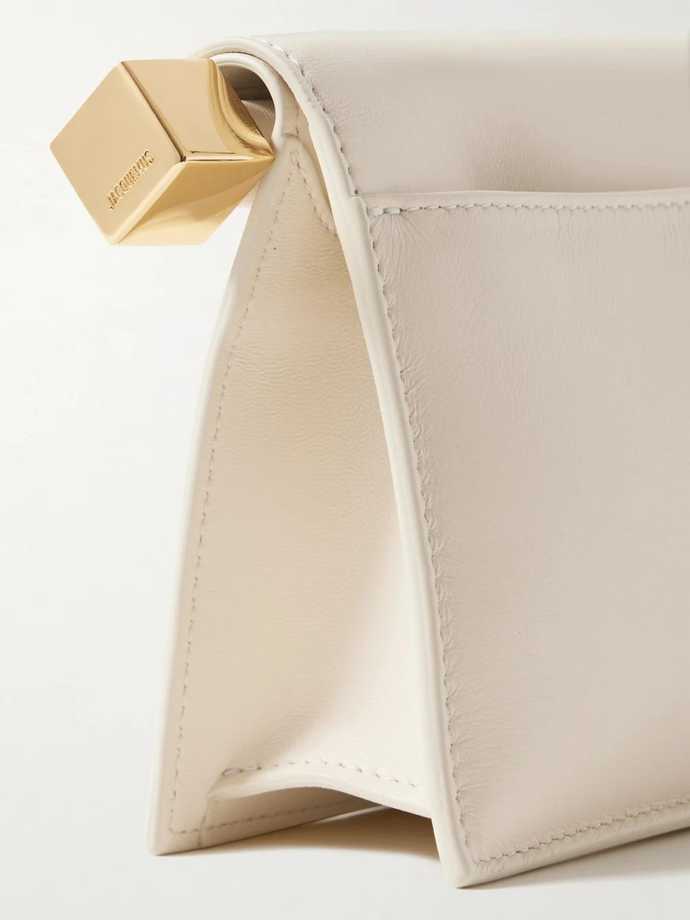 Close-up detail of the Jacquemus Pochette Small Embellished Leather Clutch