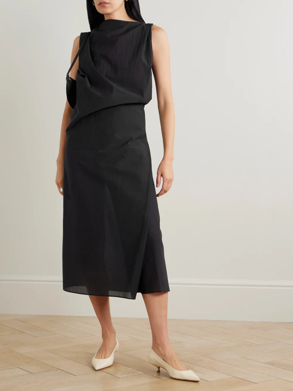 Jacquemus The Drapeado Draped Cotton-blend Gauze Midi Dress, worn by a model