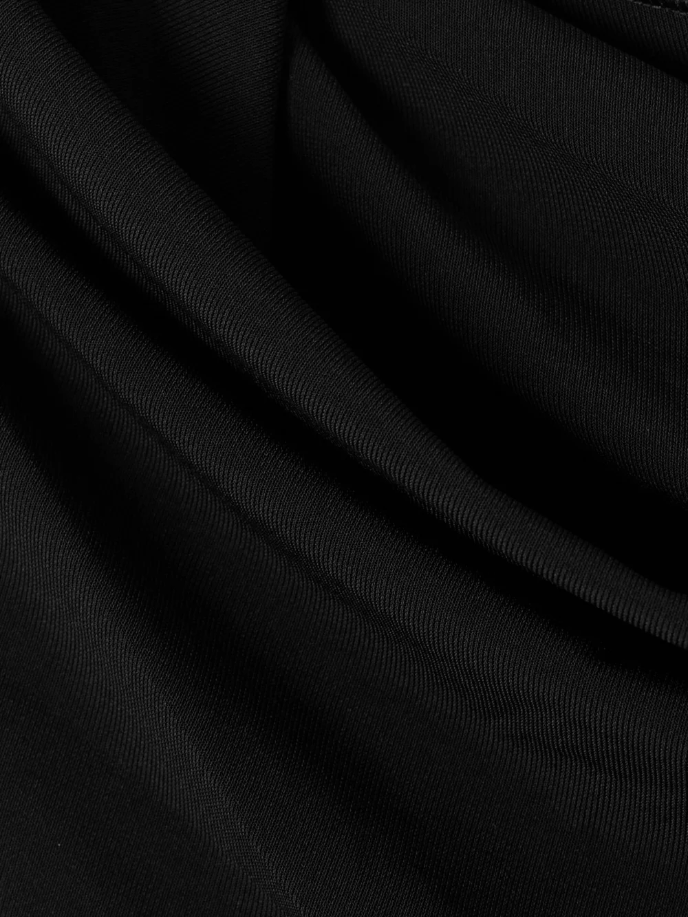 Close-up detail of the Jacquemus The Drapeado One-sleeve Jersey Midi Dress