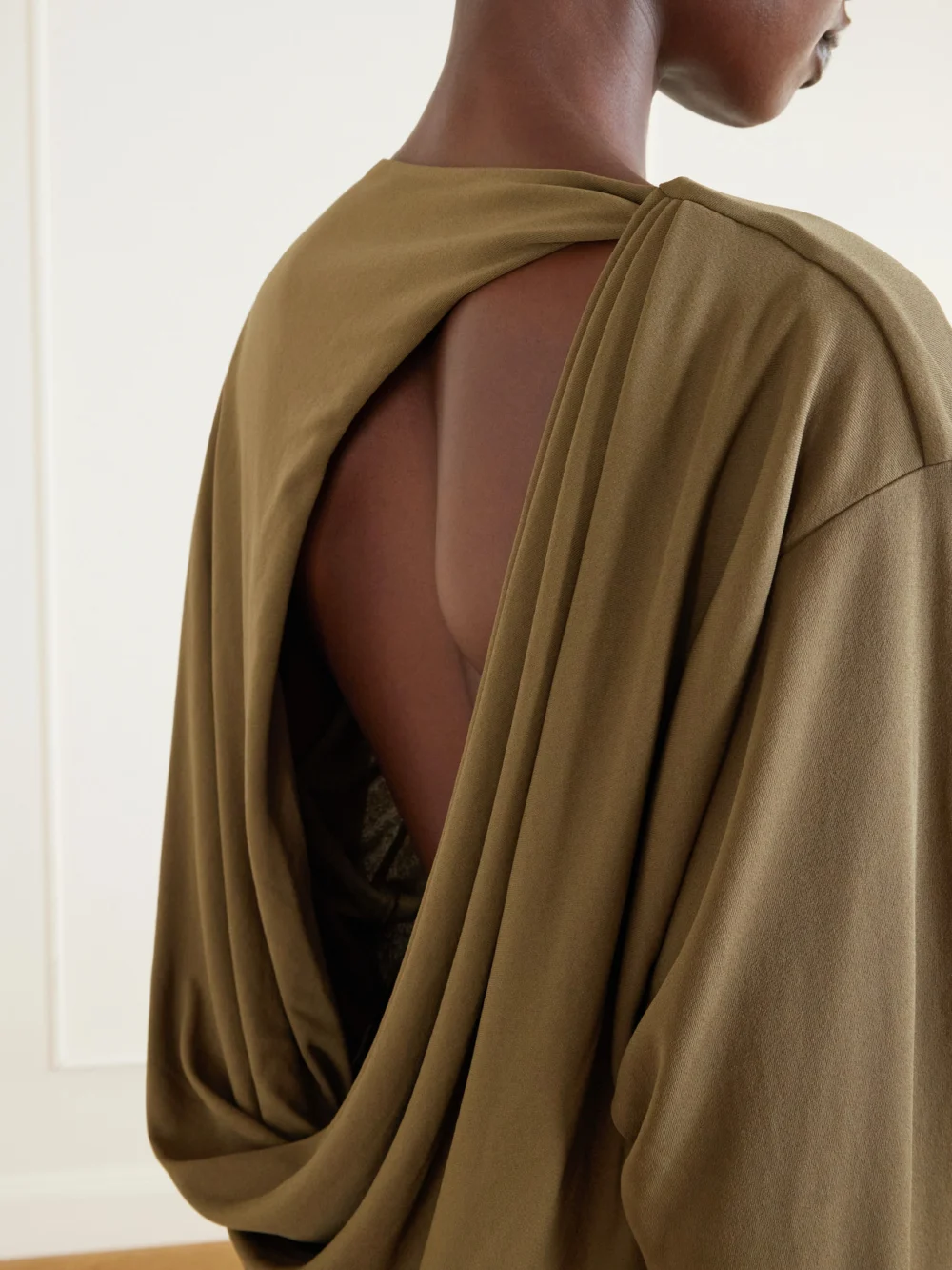 Close-up detail of the Jacquemus The Mistral Open-back Draped Jersey Mini Dress