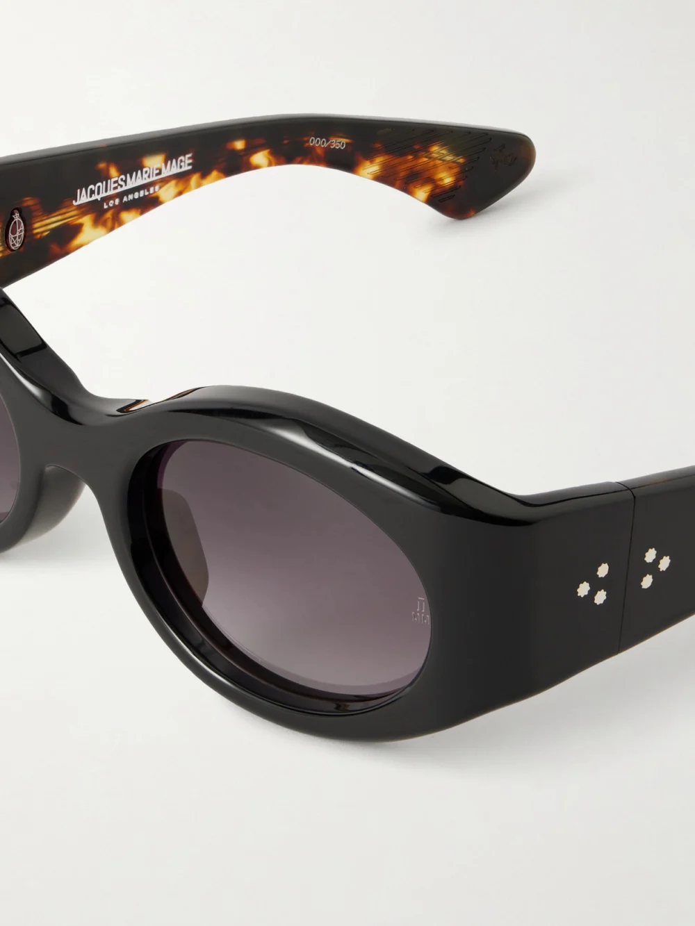 Close-up detail of the Jacques Marie Mage Gia Oversized Oval-frame Acetate Sunglasses