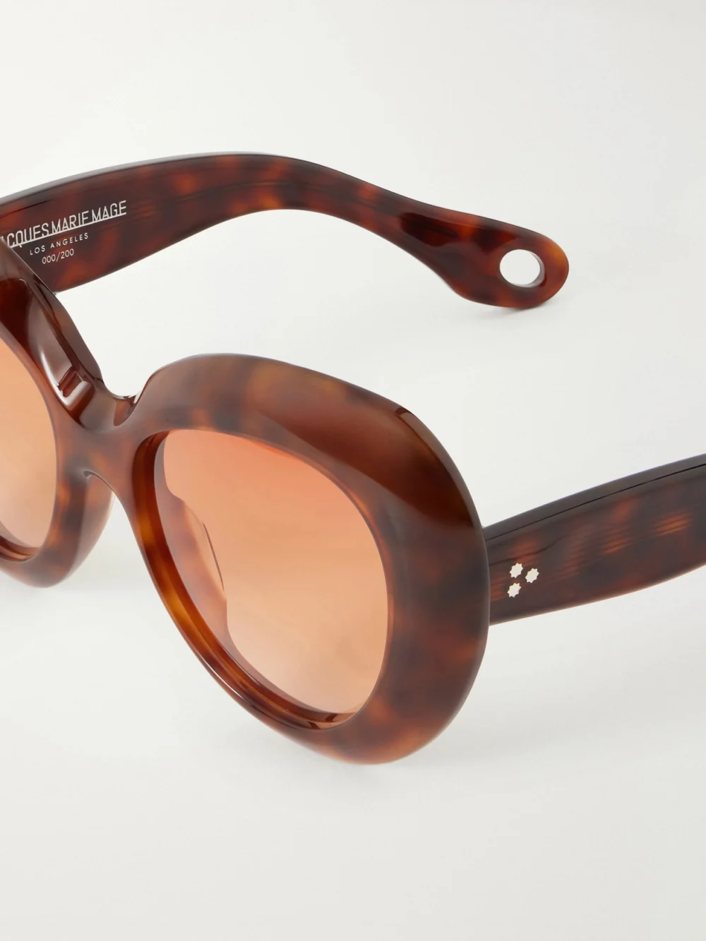 Close-up detail of the Jacques Marie Mage Monarch Round-frame Tortoiseshell Acetate Sunglasses