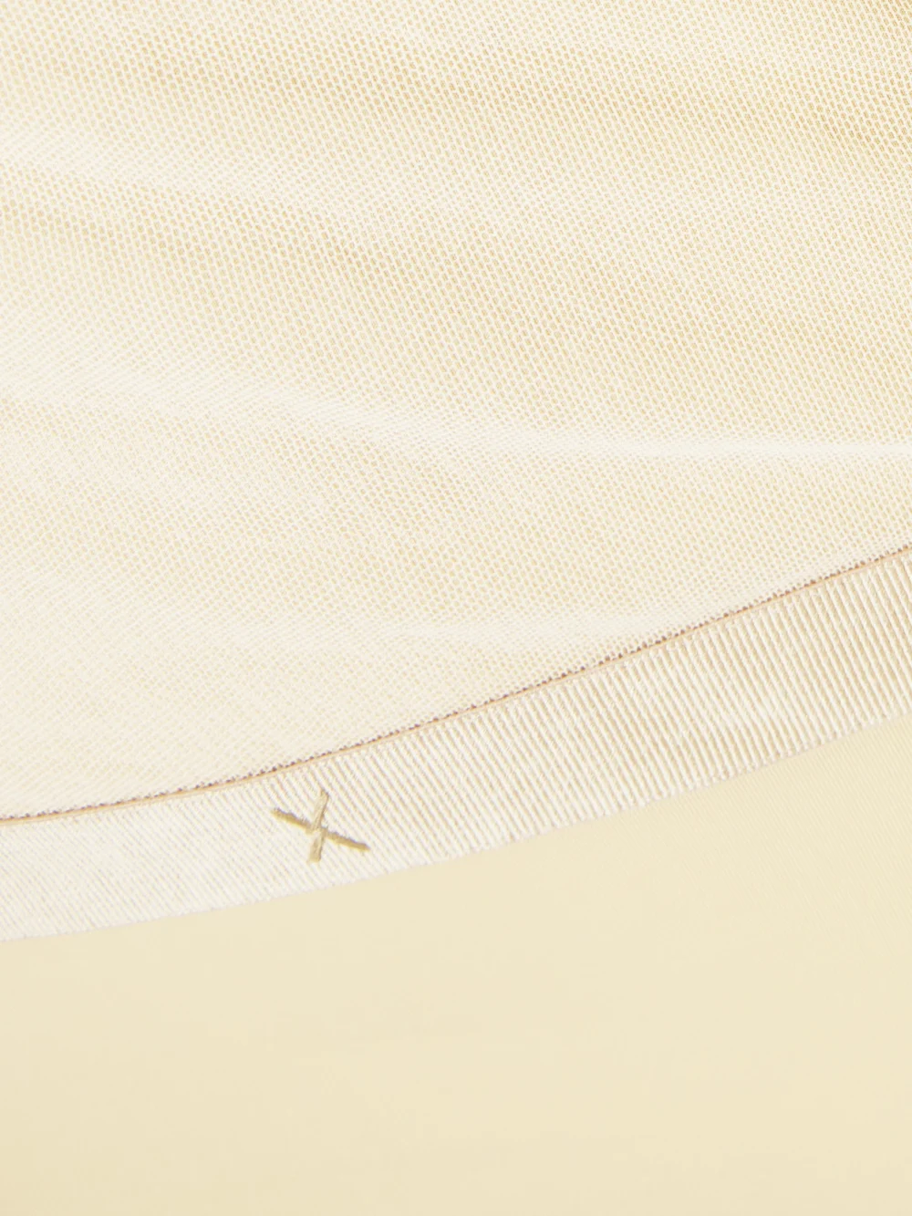 Close-up detail of the Jean Paul Gaultier Asymmetric Draped Appliquéd Mesh and Stretch-jersey Dress