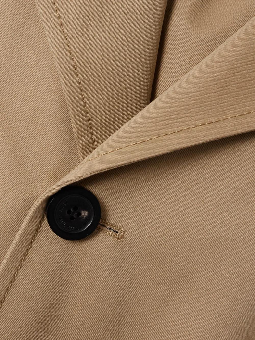 Close-up detail of the Jean Paul Gaultier Belted Layered Appliquéd Cotton-twill Trench Coat