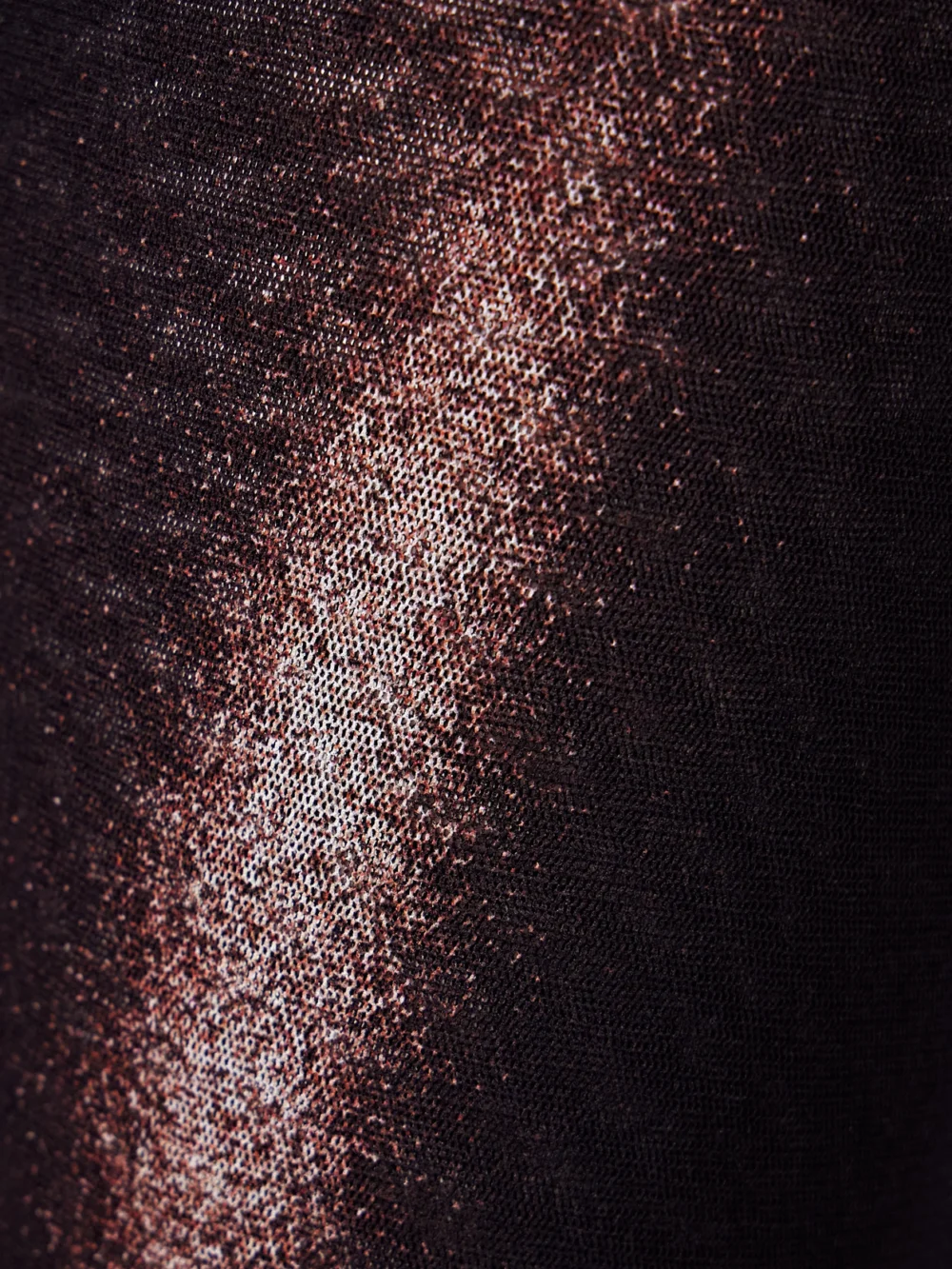 Close-up detail of the Jean Paul Gaultier Body Dust Trompe L'oeil Printed Mesh Straight-leg Pants